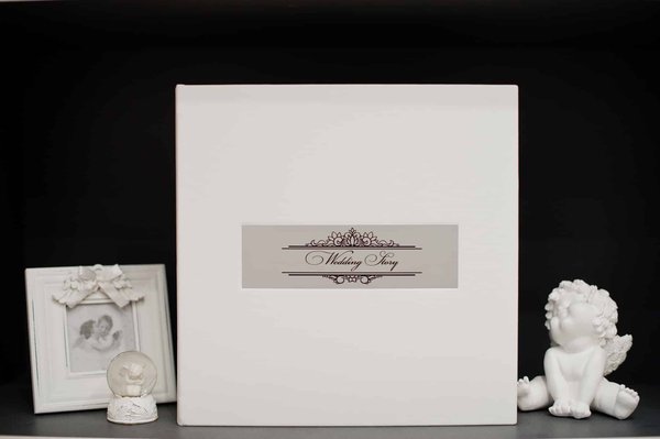 Livre photo ouverture à plat : l'importance de la reliure